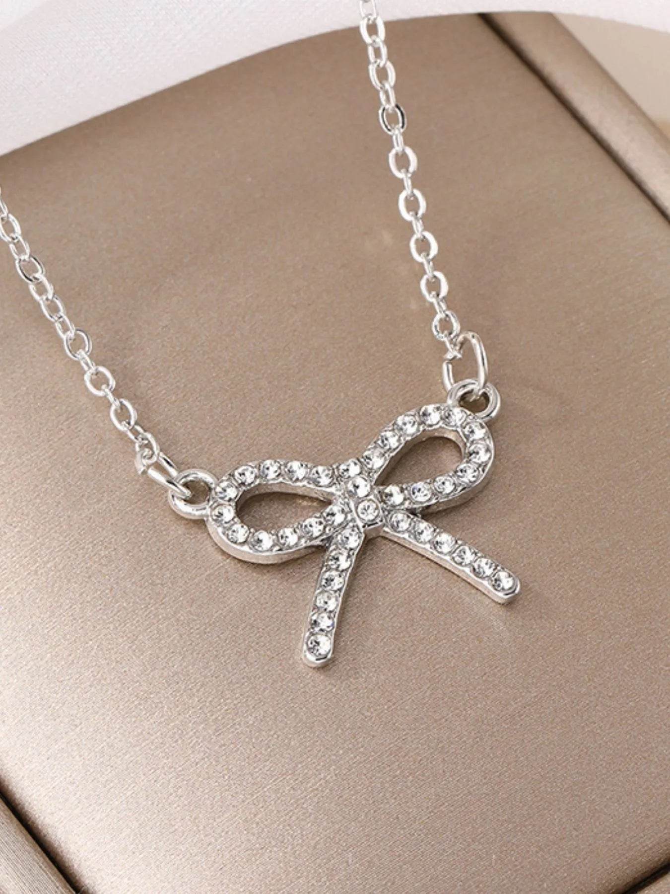 Zircon Bow Pendant Necklace - Tredona LLC