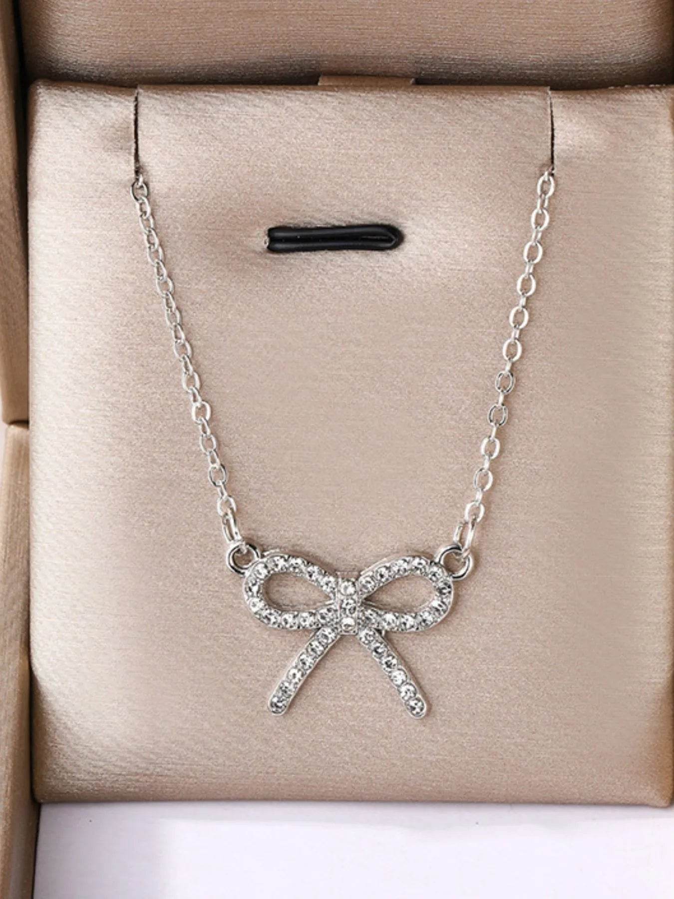 Zircon Bow Pendant Necklace - Tredona LLC