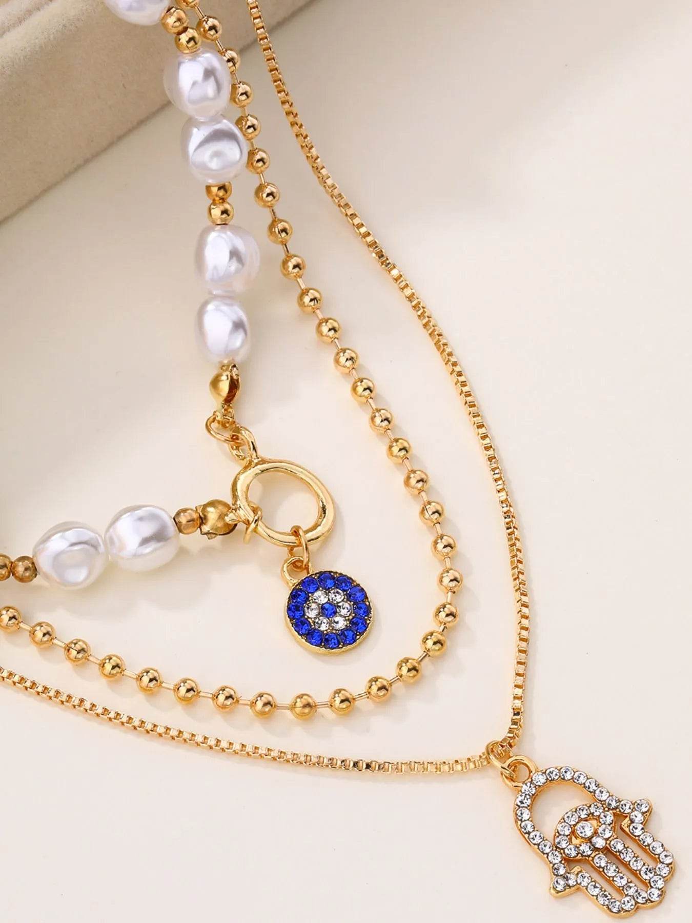 Layered Pearl Chain Evil Eye Hamsa Pendant Necklace - Tredona LLC